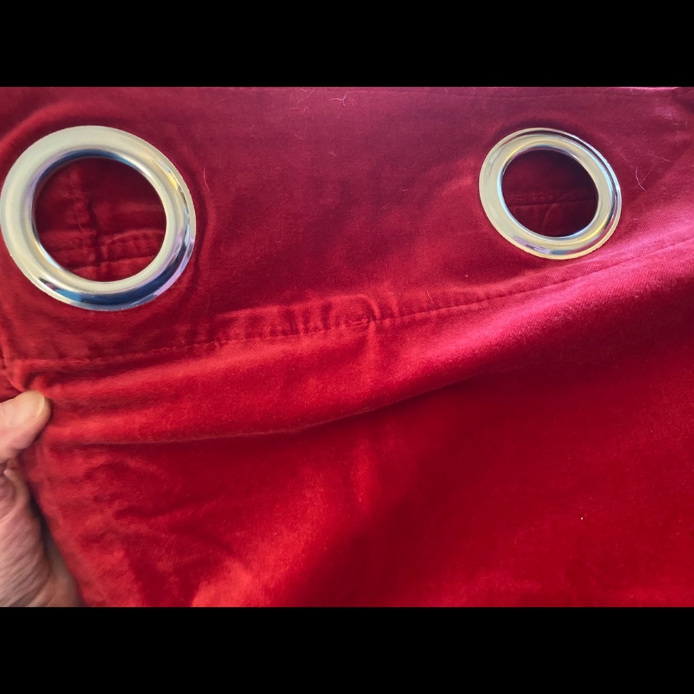 Pair of red velvet IKEA grommet curtain panels